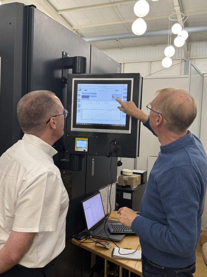 from left - Steve W & Paul B - easy grind on a machine 3 Easy Grind software on Makino Grinding machine - NCMT