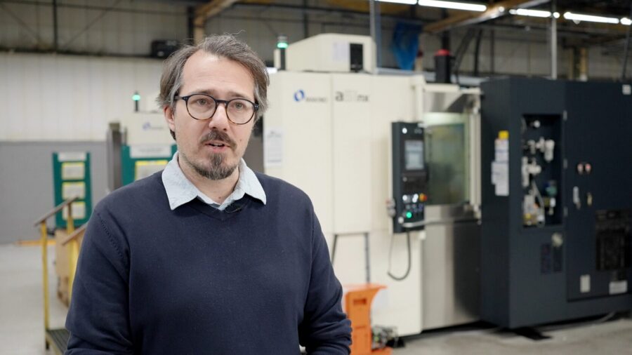 Bran Antal - Evtec Bran Antal from Evtec in front of Makino a51nx horizontal machining centre in UK facility, discussing precision machining of EV components and automotive production processes